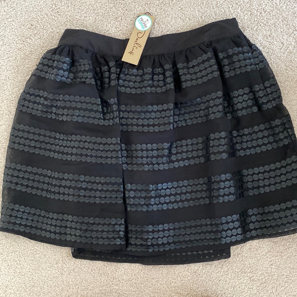 The cutest little black skirt!